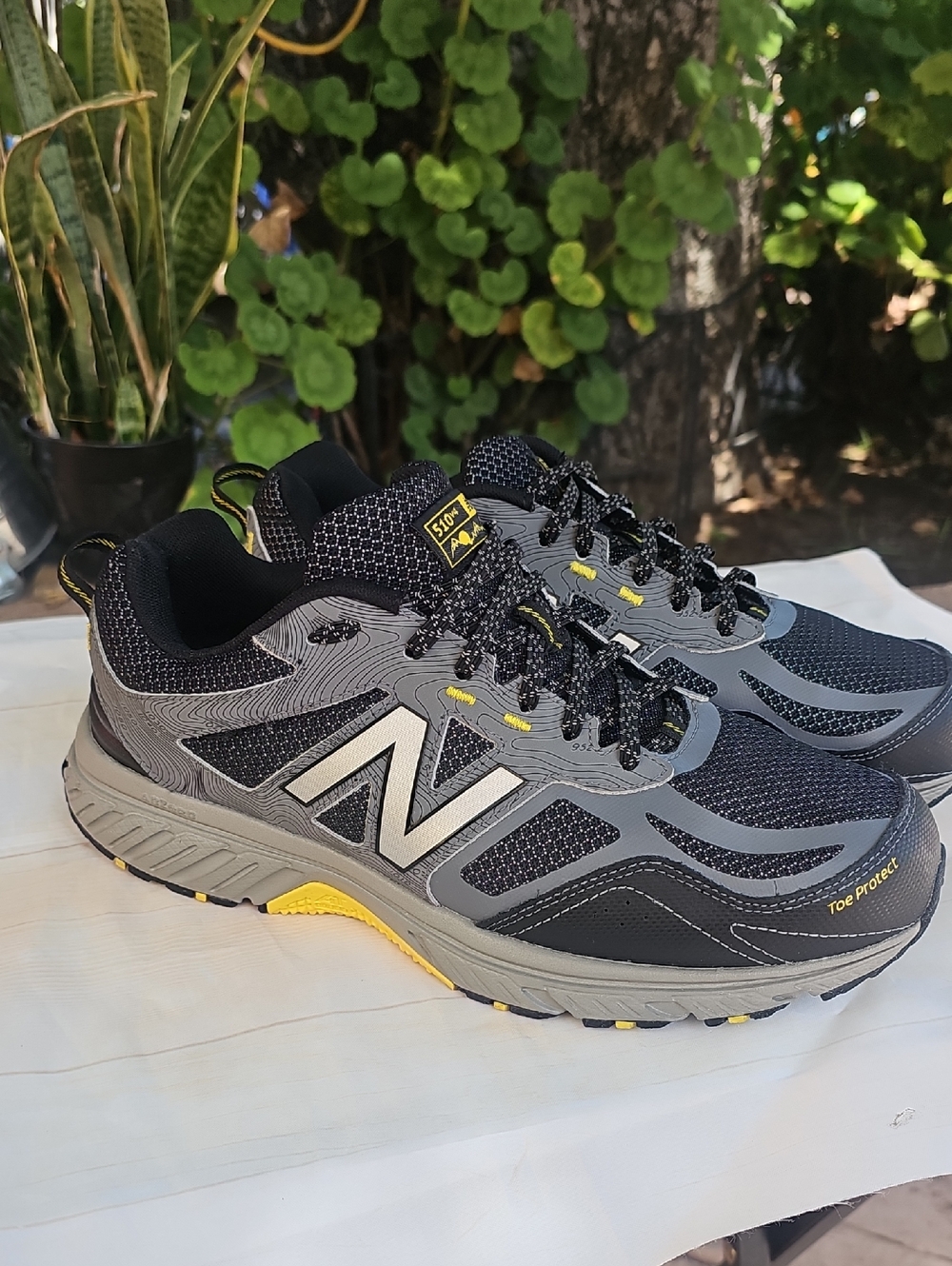 New Balance 510 V4 Men's Black and Gray Trail Sneakers with Yellow Accents